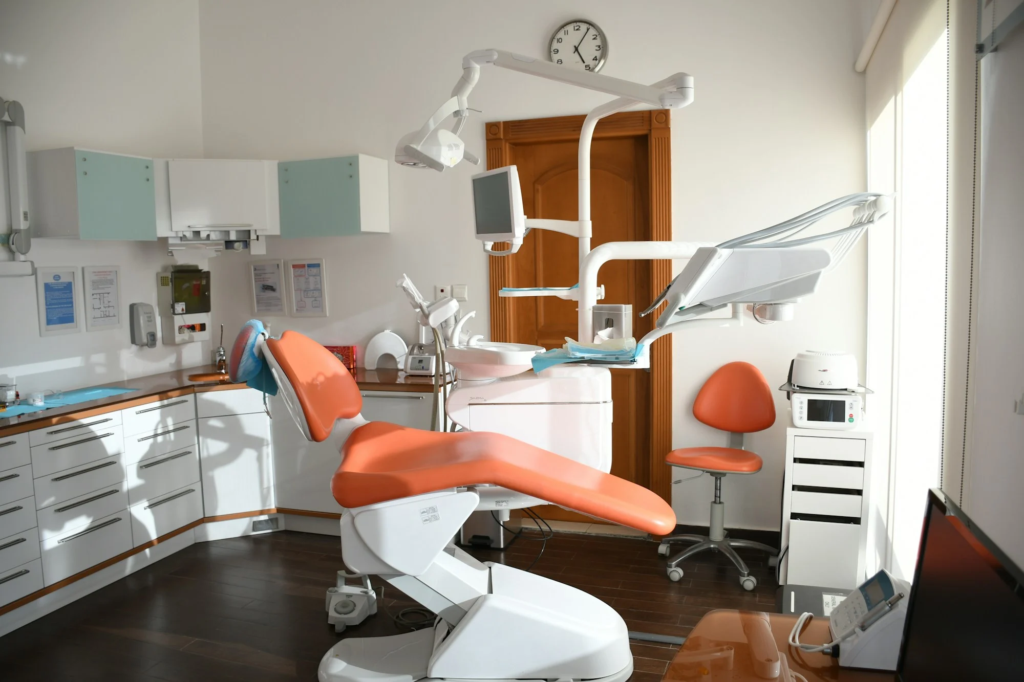 An empty dental room in window light.